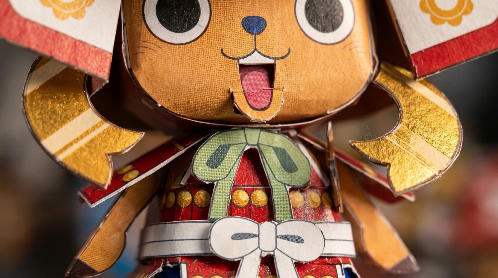 Close-up of a finished Subara papercraft character showing crisp folds and detail